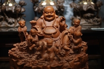 Yew Millvers home swing multi-son-to-hand sculpted smiles Buddha statues of Buddha all the best.
