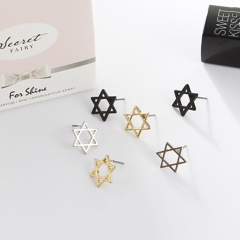Japanese and Korean temperament trendy small student earrings couples wild personality black simple hollow six-pointed star ear needle fashion