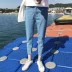 Quần jean nam bf gió nam chín điểm quần lọt khe sinh viên Hàn Quốc quần âu mùa thu quần short jean nam Quần jean