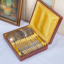 (Domestic stock) A set of sterling silver carved spoons with antique leather box