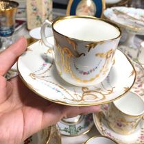 Old Paris hand-painted cups and saucers