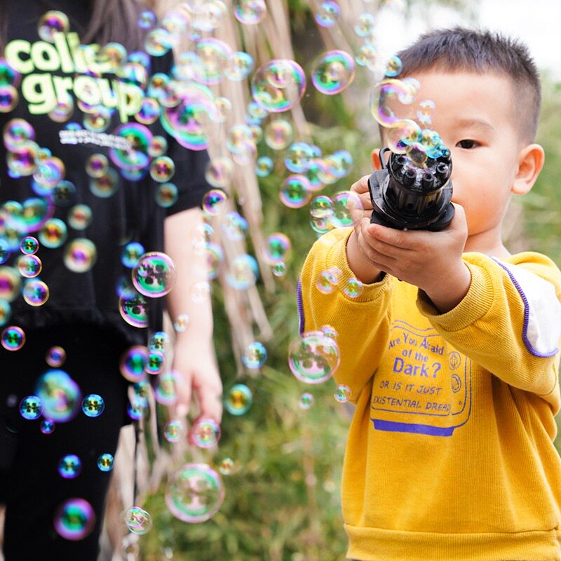 Fumbling Internet Red Red Money Gatlin Bubble Machine Children Plastic Machine Guns 8 Holes Electric Toy Boys New Year Gifts