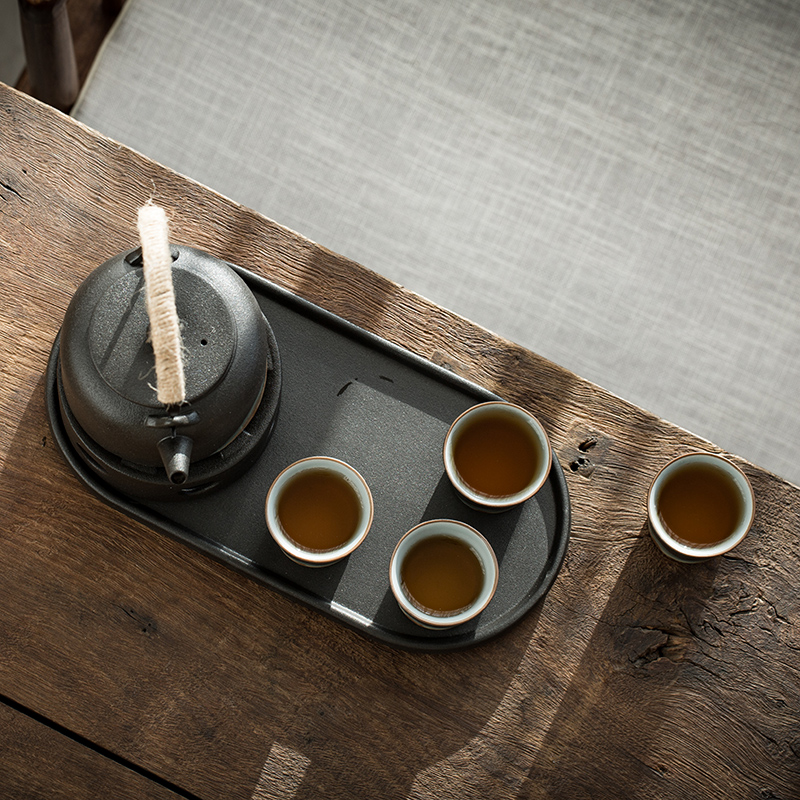 Japanese coarse pottery kung fu tea set tea pot of warm tea mountains to girder device heating base glass ceramic tea tray