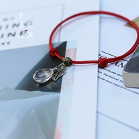 Одуванчик с красной веревкой