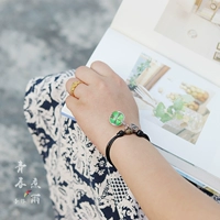 Черная веревка сферическая трава с четырьмя листьями