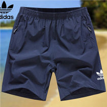 Quick-drying shorts womens five-point pants summer ultra-thin breathable outdoor men loose fattened plus size sports beach pants