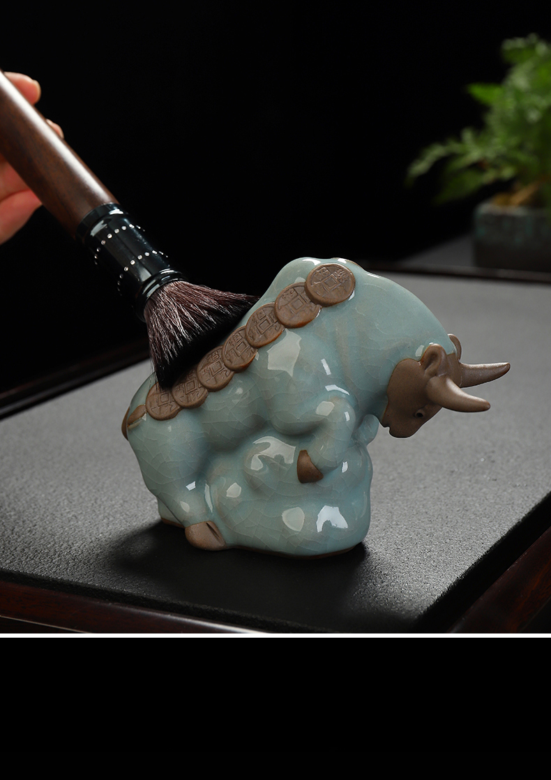 Recreation open piece of cow elder brother up with tea pet furnishing articles ceramic household adornment of Chinese zodiac cattle tea tea to play