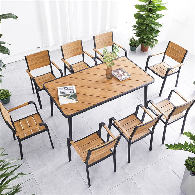 Outdoor anti-corrosion plastic wood creative Nordic waterproof high-end dining room villa courtyard balcony leisure outdoor table and chair combination