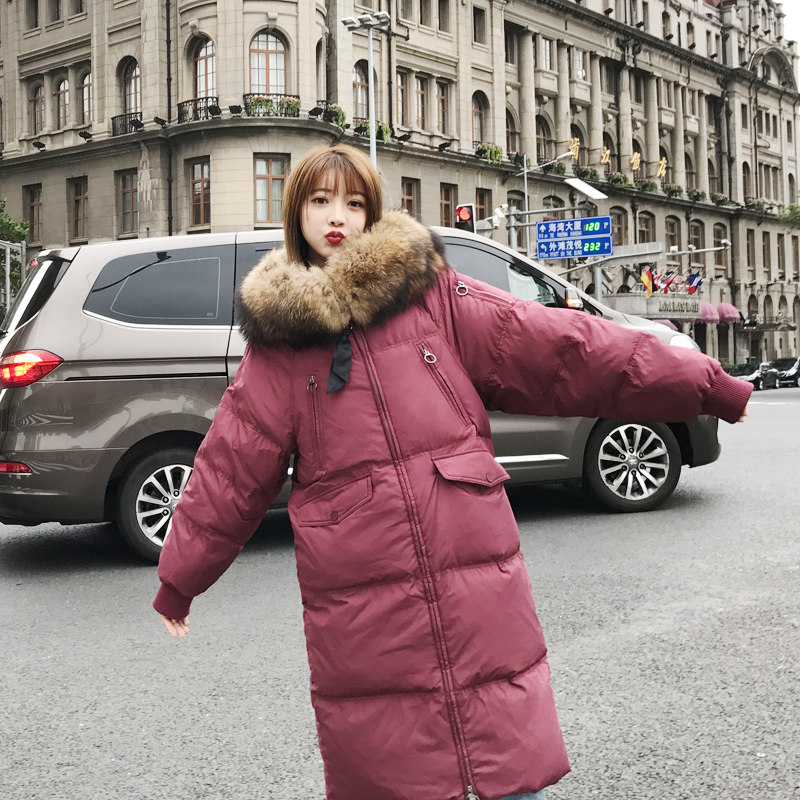 Anti-season clearance down jacket women's long knee-length 2022 winter new solid color thickened ins cotton clothing big hair collar trend