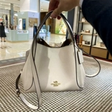 Шанхай Кангканг искренний магазин скидок. Специальные предложения по рекомендации Little Red Book Новая кожаная большая пакет батареи.