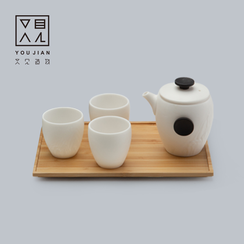 And creation of dehua white porcelain teapot teacup tea sets, small household contracted a pot of three cups of Japanese dry terms plate