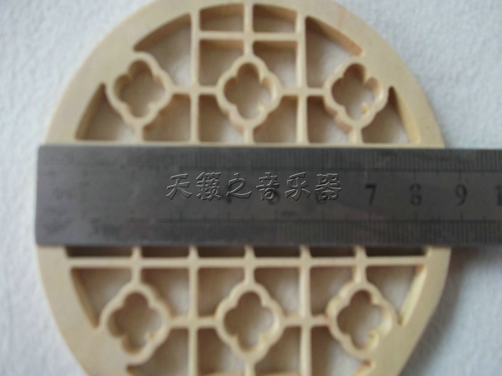 Factory direct sales of ethnic musical instrument accessories in the Huyin window jujube wood color wood diameter 9 cm round type