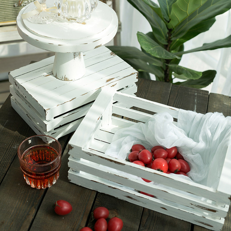 Styling containing basket for old white flaking mottled wood frame level styling frame white wedding dessert table