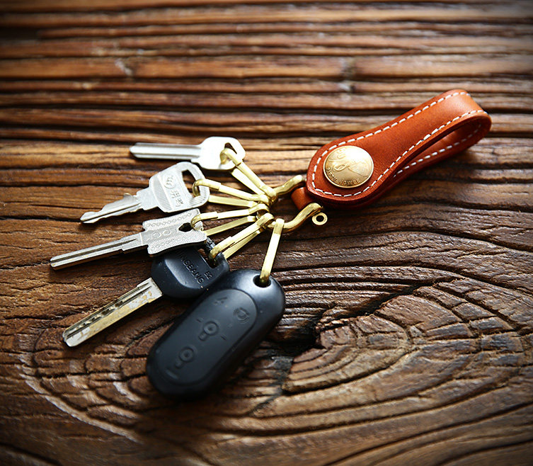 Брелок 手工植鞣牛皮钥匙扣男士简约头层真皮纯铜五金腰挂财布扣钥匙串 Cattle breeders