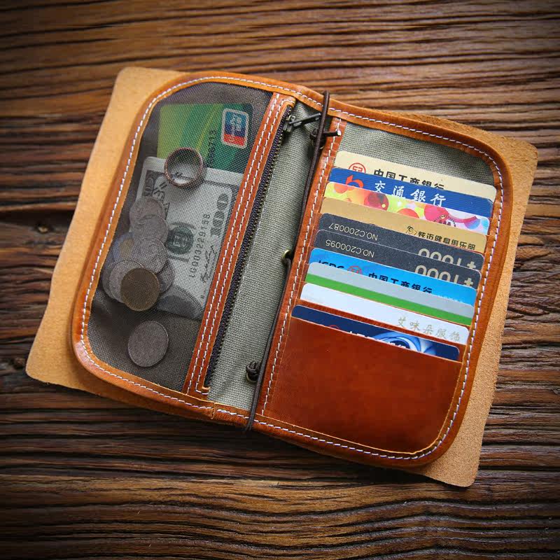 Vintage vegetable tanned first layer cowhide wallet leather multi-function clutch bag men's handbag storage bag hand grab passport bag