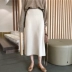 Váy nữ mùa thu mới chic đơn giản cao eo màu rắn đan Một từ váy hoang dã túi mỏng hip midi váy chân váy dài hàn quốc Váy