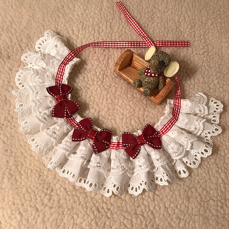 Cat dog dog necklace necklace bell tie lace tie towel towel dog round the pocket