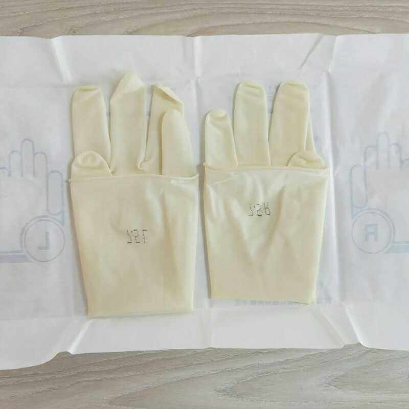 Henan Kenqi disposable use of medical surgical glove medical glove thickened glove