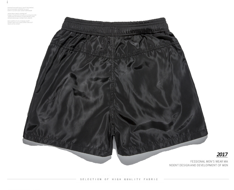 Quần short thể thao nam chạy ba quần của nam giới nhanh chóng làm khô 3 điểm quần short đơn giản màu sắc hoang dã vài bãi biển quần triều quần gió thể thao nam