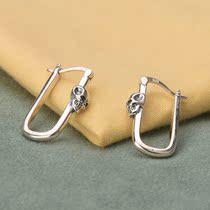 Pure silver S925 minimalist personality temperament fashion Skull skull head fresh and delicate creative hyperbolic staggered high-grade ear decoration