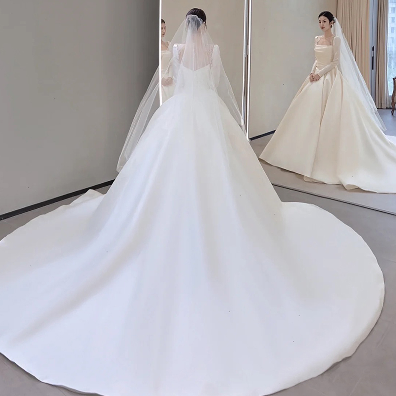 Long -sleeved satin wedding dress 2024 new bride atmosphere, simple super immortal French dragging door main gauze high -level sense Long -sleeved satin wedding dress 2024 new bride atmosphere, simple super immortal French dragging door main gauze high -level sense