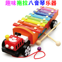 Train tug on the violin and xylophone childrens hands Knocks the 1-2-3-year-old baby Knocks the instrument Puzzle Force Toy