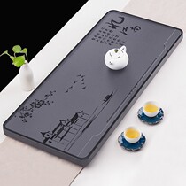 Creative black gold stone tea tray Stone head natural whole piece of rough stone running water large tea table Household simple Kung Fu tea tray