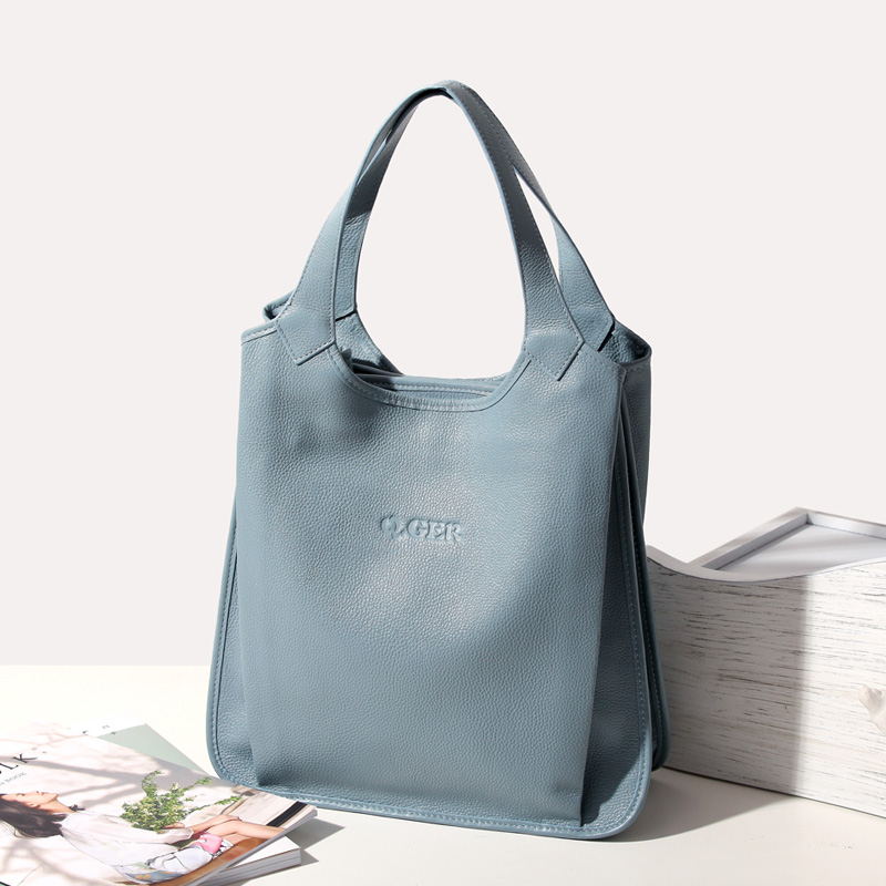 Qingge's new first-layer cowhide leather all-match large-capacity multi-compartment vertical single-shoulder large bag literary women's bag