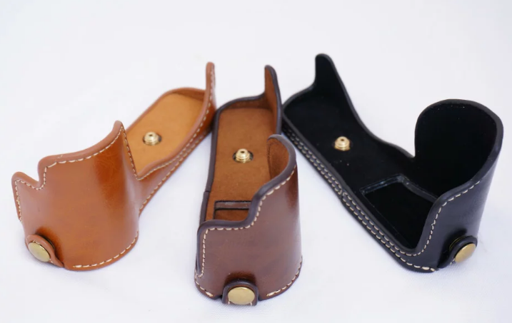 Applicable Sony 5000 5100 camera base camera leather base protection half cover handle detachable battery