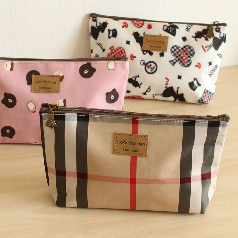 Retro pastoral wind waterproof Oxford cloth cat dog dumpling type cosmetic bag storage bag washing bag a variety of choices