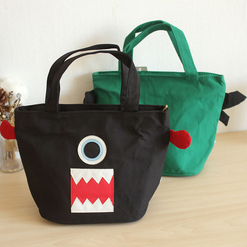 Cute high-quality canvas funny little monster student office worker bento bag bento bag small bag