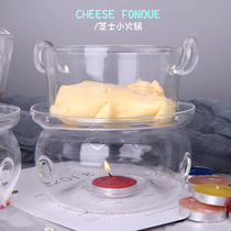 Full glass cheese fondue chocolate melting pot butter melted milk water baking pan