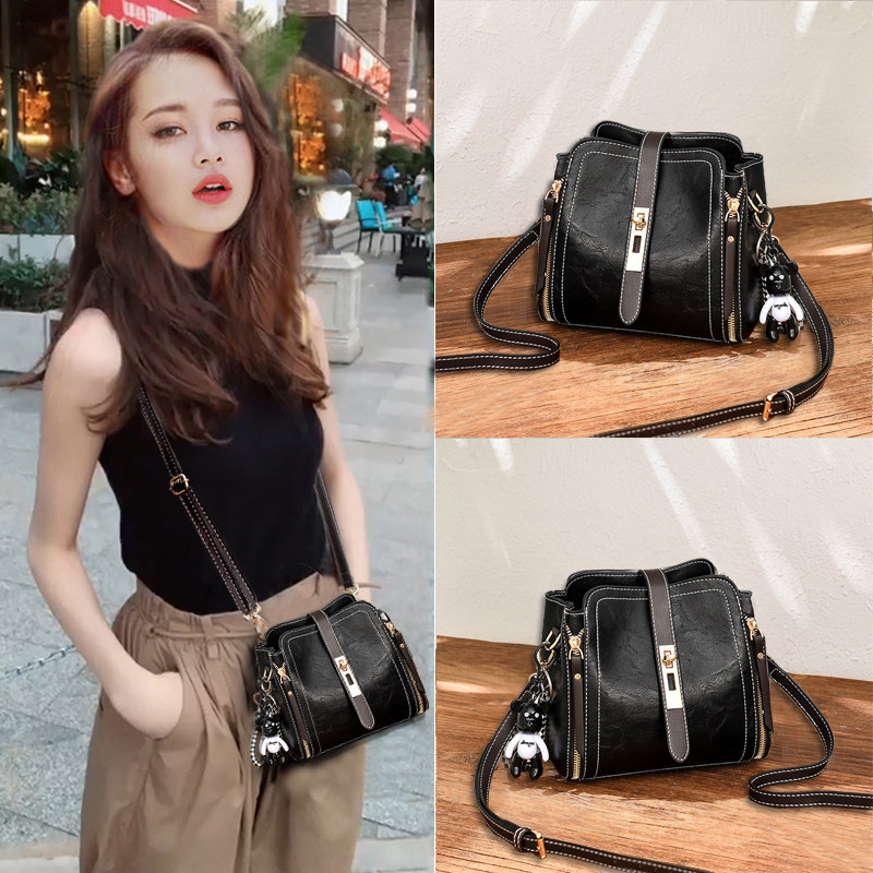 Hong Kong 2021 new all-match fashion leather one-shoulder small ladies bag foreign style portable Messenger pet bucket bag trendy