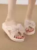 Bow slippers women's summer 2021 new wedge heel thick bottom fashion wild word drag non-slip wear beach shoes