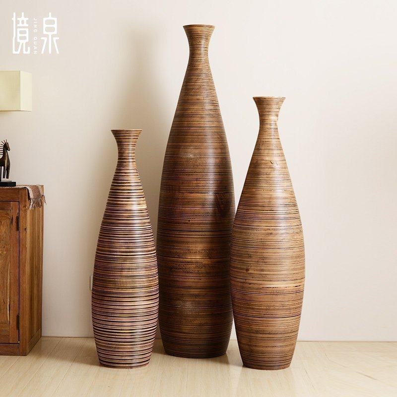 Thailand imports large solid wood vase landing and opening large decorative artwork at Southeast Asia Hotel Club