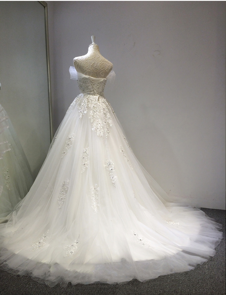 Lace wedding dress for bride, 2023 collection, open shoulders, fitted Lace wedding dress for bride, 2023 collection, open shoulders, fitted