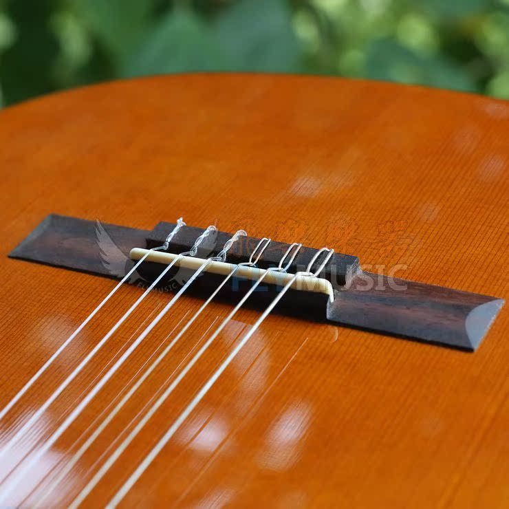 Fei Le Nhạc cụ 100% Pure Bovine Guitar cổ điển cuộn dây gối dưới bộ gối - Phụ kiện nhạc cụ dây guitar