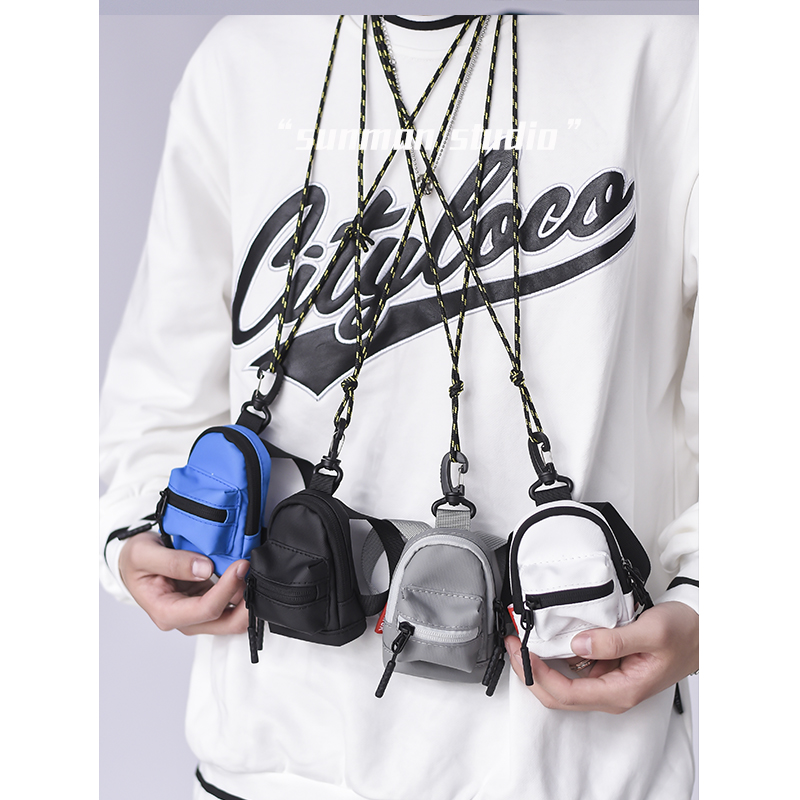 Mini hanging neck bag zero money card bag headphones Bauins personality small satchel key inclined satchel bag men's boobs bag-Taobao