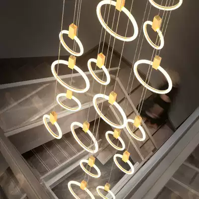 Nordic lamps modern simple light luxury creative art circle living room Villa staircase lamp duplex long chandelier