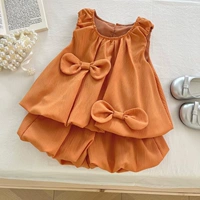 Оранжевый комплект с бантиком