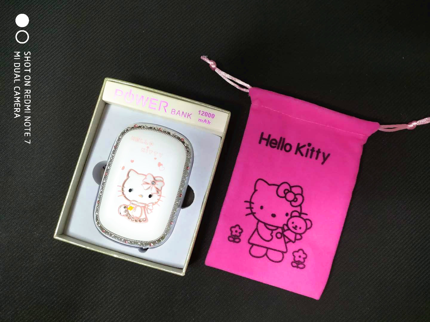 Hello kitty sạc kho báu dễ thương 12000 Hello Kitty phim hoạt hình điện thoại di động nhỏ cầm tay nhỏ với máy khoan - Ngân hàng điện thoại di động anker sạc dự phòng