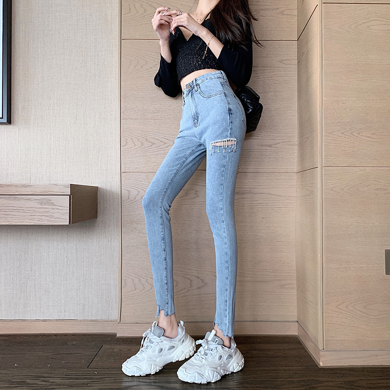 Light blue jeans women's 202 spring and autumn new high-waisted sexy tight-fitting thin ripped pencil pants trendy