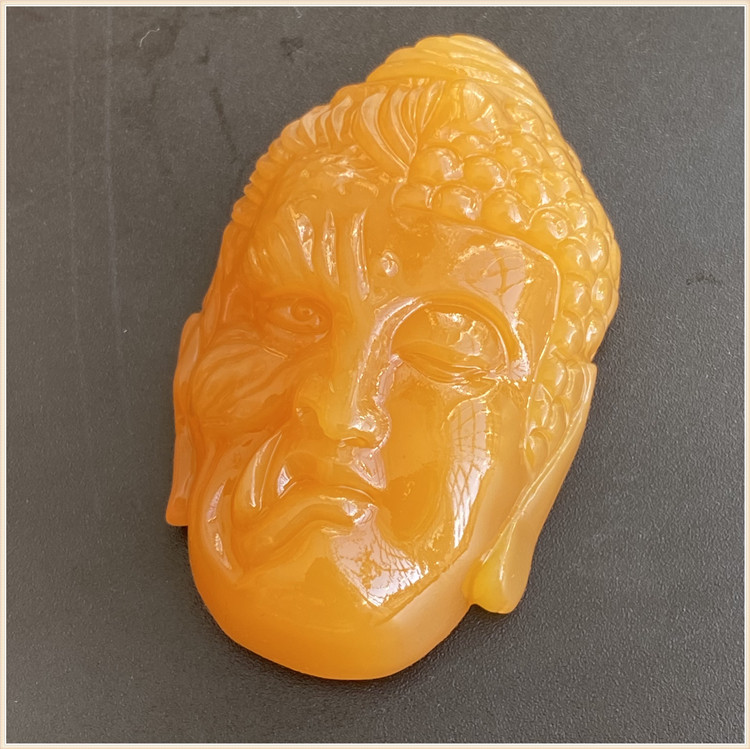 Huanglongyu Burmese Huang Yinian becomes a Buddha magic pendant Buddha head magic head pendant Burmese material emperor yellow chicken oil yellow
