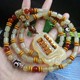 Natural Tibetan horn bucket beads multi-circle Buddha beads bracelet yellow material translucent polished bracelet for women's necklace for heat and detoxification