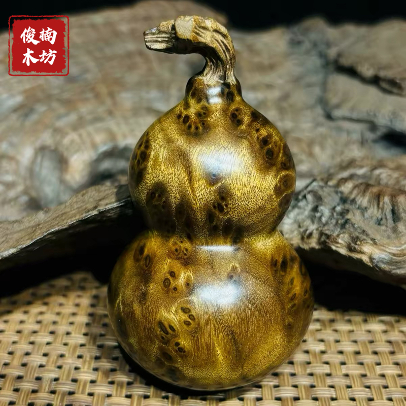 High-End Golden Nanmu Wood Sesame Vein Small Gourd Hand-Held Ornament, Portable Plaything, Premium Small Hand-Twisted Pendant High-End Golden Nanmu Wood Sesame Vein Small Gourd Hand-Held Ornament, Portable Plaything, Premium Small Hand-Twisted Pendant