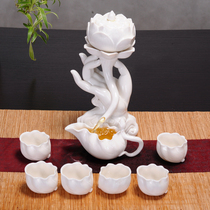 Defied white porcelain tea set suit Purple Sand Semiautomatic Buddha hand Guanyin lazy person punching tea ware Rotating Tea Set Gift Box