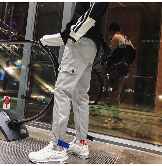 Multi-Pocket ins super fire overalls nam thương hiệu chic chic lỏng lẻo phiên bản Hàn Quốc của xu hướng quần chín điểm giản dị quần jogger nam