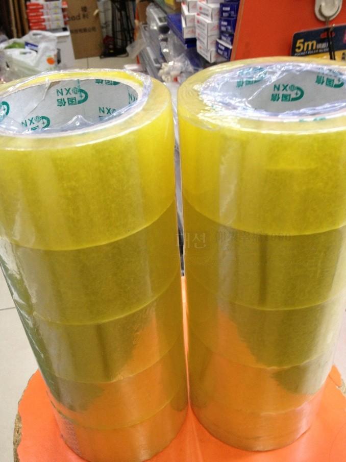 Beijing physical stores wholesale country letter adhesive tape 300 yard seal case adhesive tape 5 3 cm wide transparent yellow rubberized fabric