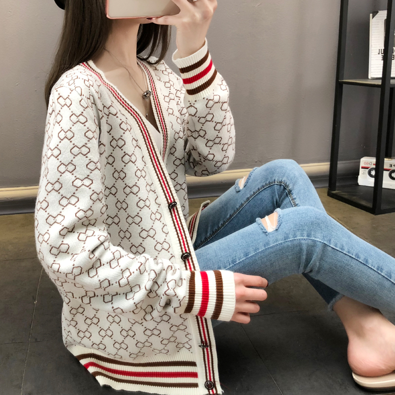 Áo len xuân hè 2019 mới và áo len nữ ngắn đoạn ngắn Hàn Quốc phiên bản mùa xuân và mùa thu hoang dã bên ngoài áo khoác nữ dệt kim dài tay áo len nữ cổ cao
