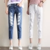 Quần jeans rách lỗ chín quần xuân hè 2019 nữ mới làn sóng Hàn Quốc bf hoang dã cao eo rộng quần dài - Quần jean